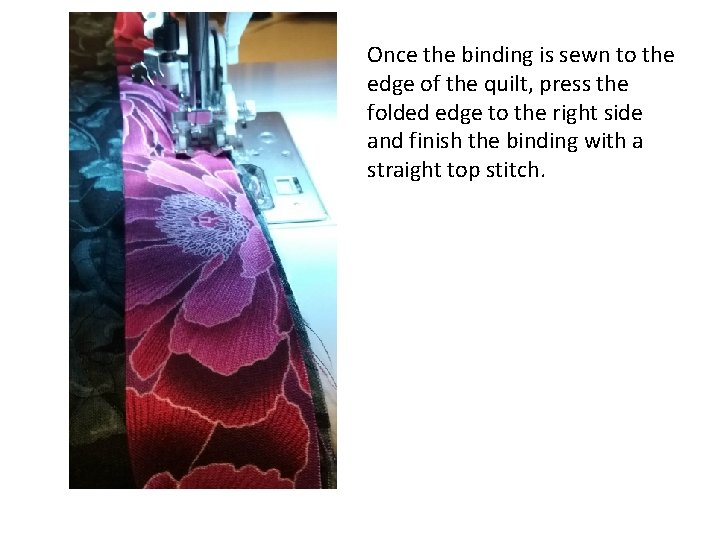 Once the binding is sewn to the edge of the quilt, press the folded Once the binding is sewn to the edge of the quilt, press the folded