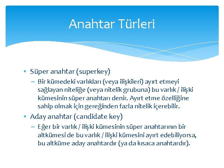 Anahtar Türleri • Süper anahtar (superkey) – Bir kümedeki varlıkları (veya ilişkileri) ayırt etmeyi