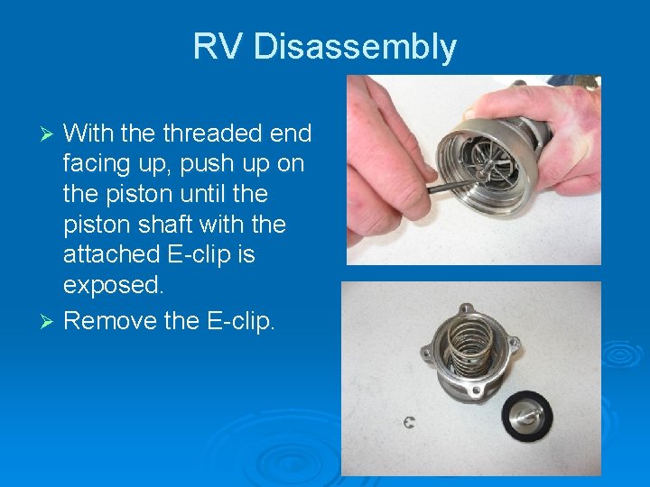 RV Disassembly With the threaded end facing up, push up on the piston until
