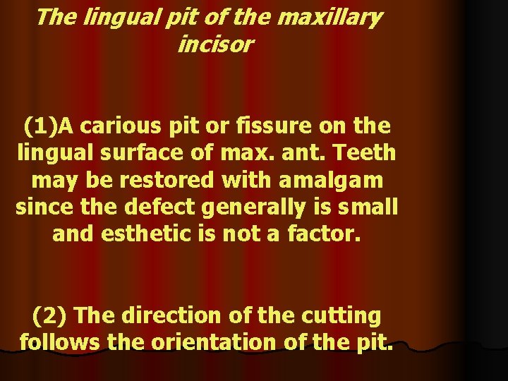 The lingual pit of the maxillary incisor (1)A carious pit or fissure on the