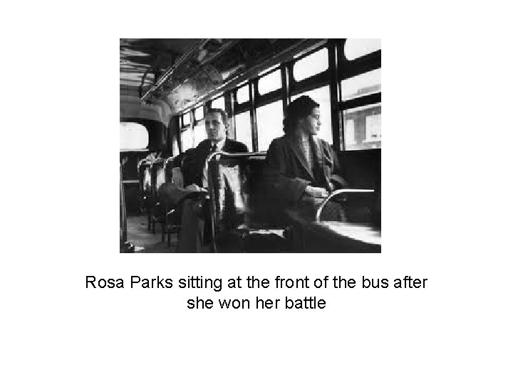 Rosa Parks sitting at the front of the bus after she won her battle