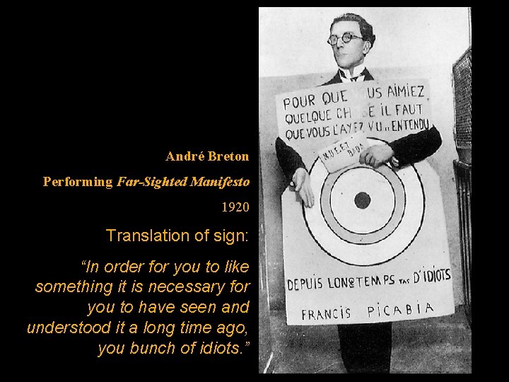 André Breton Performing Far-Sighted Manifesto 1920 Translation of sign: “In order for you to