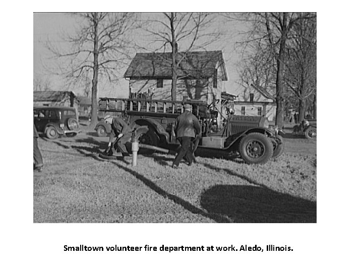 Smalltown volunteer fire department at work. Aledo, Illinois. 