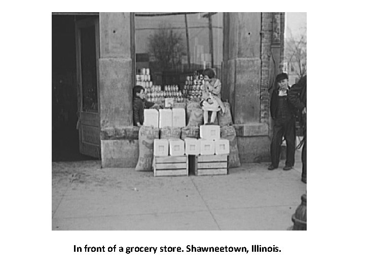 In front of a grocery store. Shawneetown, Illinois. 