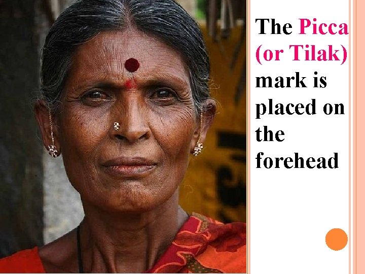 The Picca (or Tilak) mark is placed on the forehead 