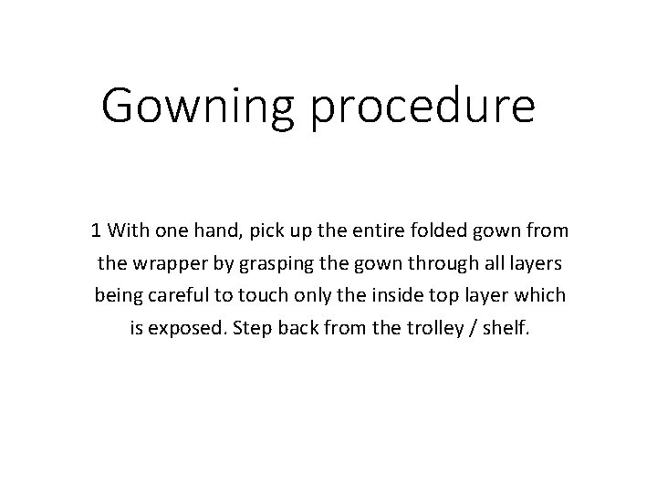 Gowning procedure 1 With one hand, pick up the entire folded gown from the