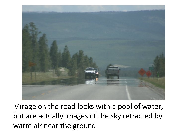 Mirage on the road looks with a pool of water, but are actually images