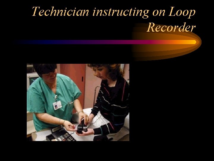 Technician instructing on Loop Recorder 