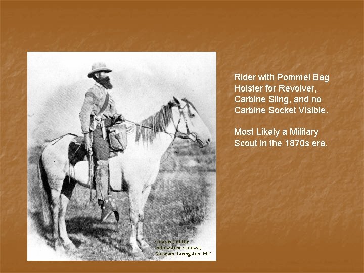 Rider with Pommel Bag Holster for Revolver, Carbine Sling, and no Carbine Socket Visible.