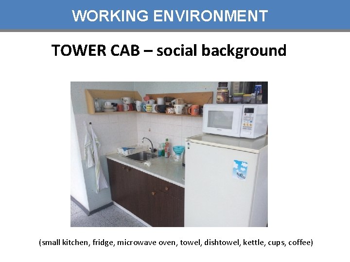 WORKING ENVIRONMENT TOWER CAB – social background (small kitchen, fridge, microwave oven, towel, dishtowel,