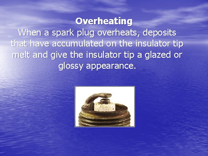 Overheating When a spark plug overheats, deposits that have accumulated on the insulator tip