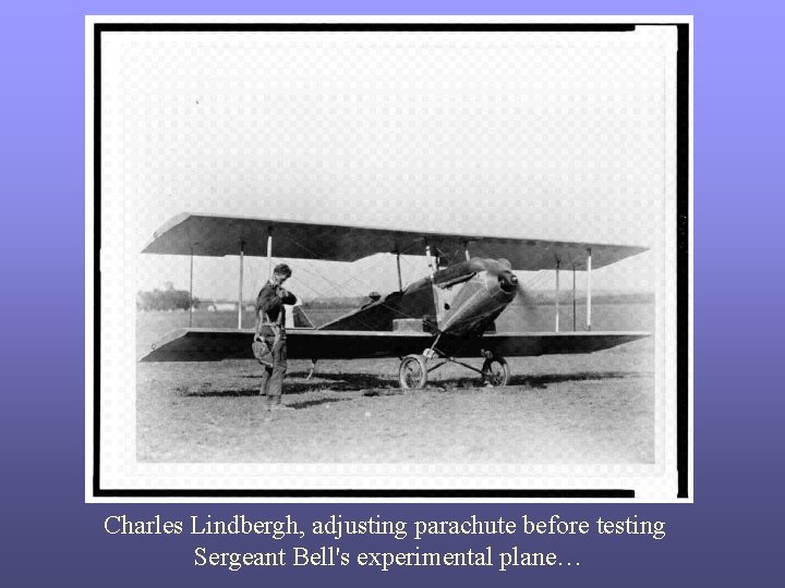 Charles Lindbergh, adjusting parachute before testing Sergeant Bell's experimental plane… 