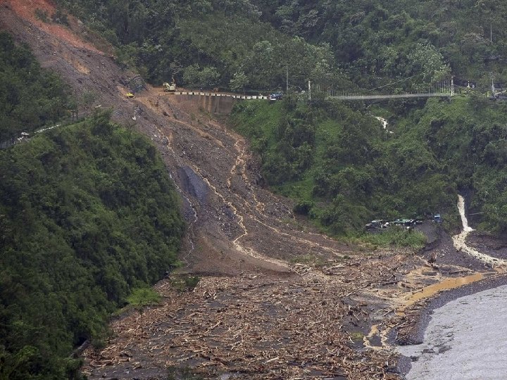 TYPHOON MORAKOT: TAIWAN; LANDSLIDE BURIES VILLAGE OF 1, 000 