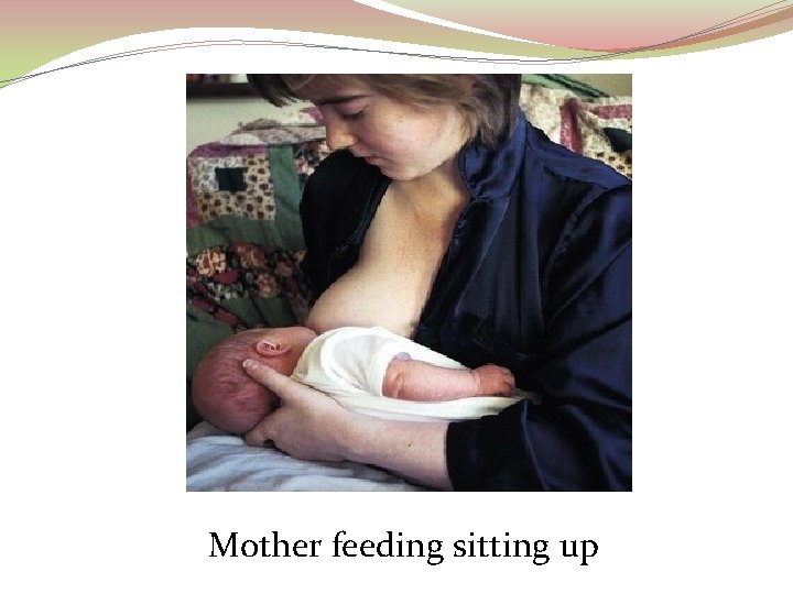 Mother feeding sitting up 