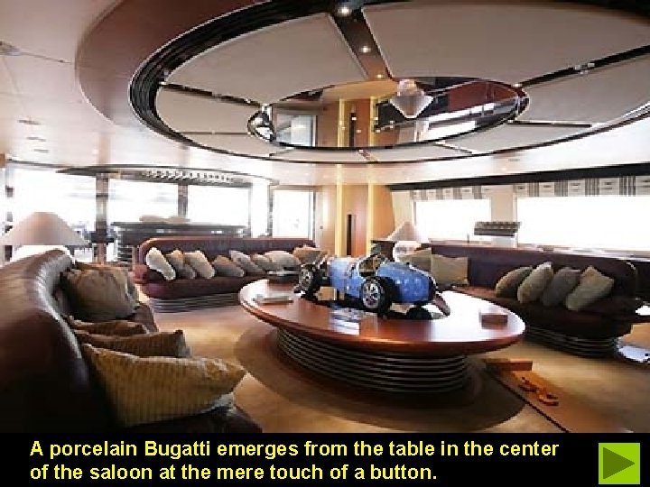 A porcelain Bugatti emerges from the table in the center of the saloon at