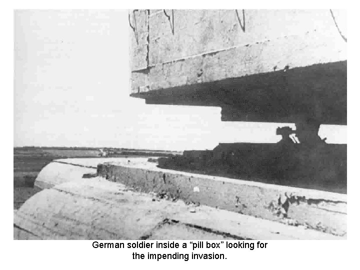 German soldier inside a “pill box” looking for the impending invasion. German soldier inside a “pill box” looking for the impending invasion.
