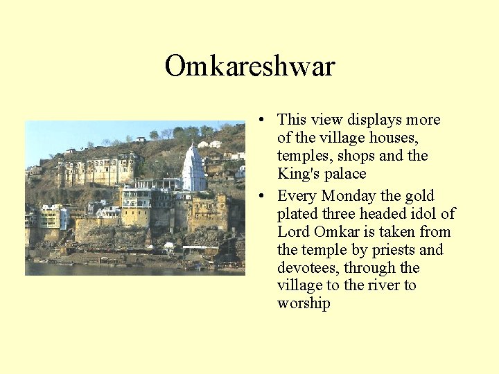 Omkareshwar • This view displays more of the village houses, temples, shops and the