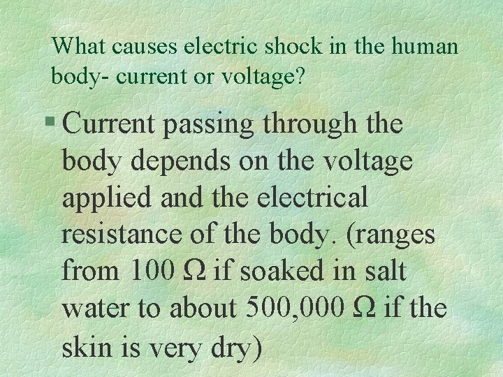 What causes electric shock in the human body- current or voltage? § Current passing