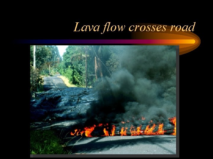 Lava flow crosses road 