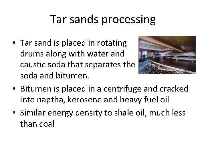 Tar sands processing • Tar sand is placed in rotating drums along with water