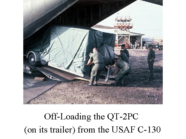 Off-Loading the QT-2 PC (on its trailer) from the USAF C-130 