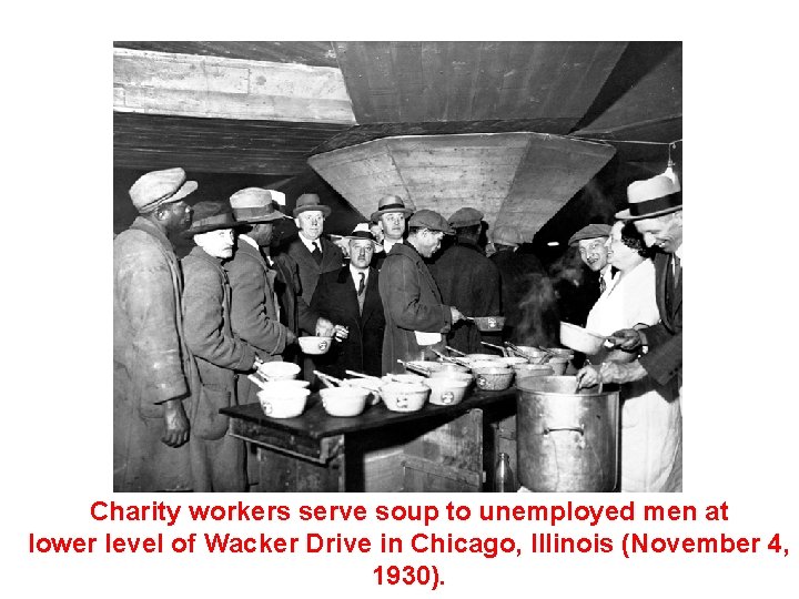 Charity workers serve soup to unemployed men at lower level of Wacker Drive in