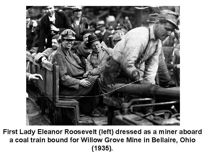 First Lady Eleanor Roosevelt (left) dressed as a miner aboard a coal train bound