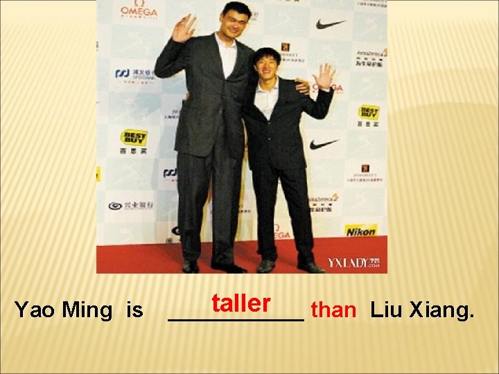 Yao Ming is taller ______ than Liu Xiang. 