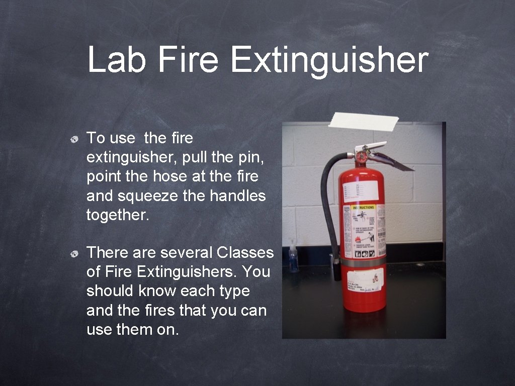 Lab Fire Extinguisher To use the fire extinguisher, pull the pin, point the hose