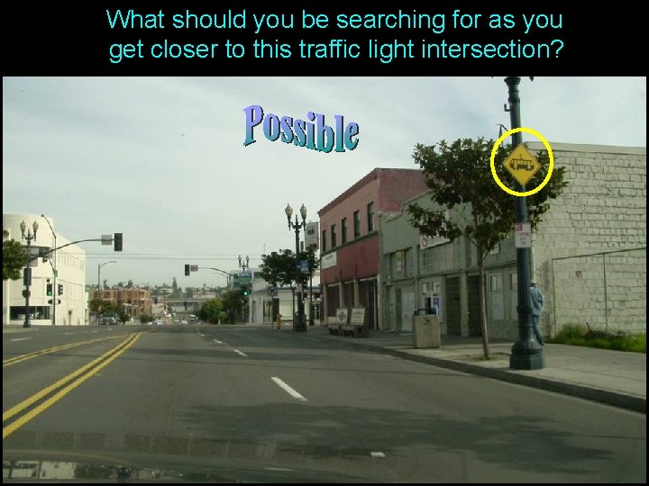 What should you be searching for as you get closer to this traffic light What should you be searching for as you get closer to this traffic light
