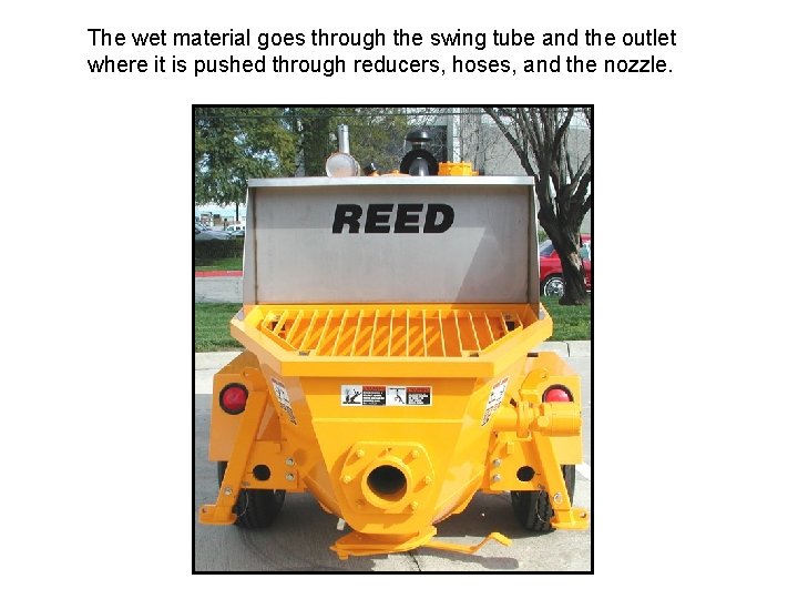 The wet material goes through the swing tube and the outlet where it is