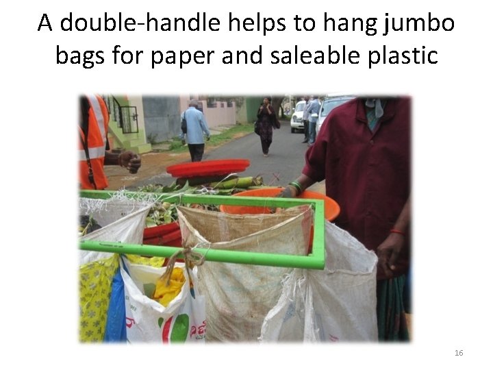 A double-handle helps to hang jumbo bags for paper and saleable plastic 16 