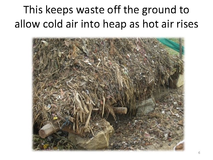 This keeps waste off the ground to allow cold air into heap as hot