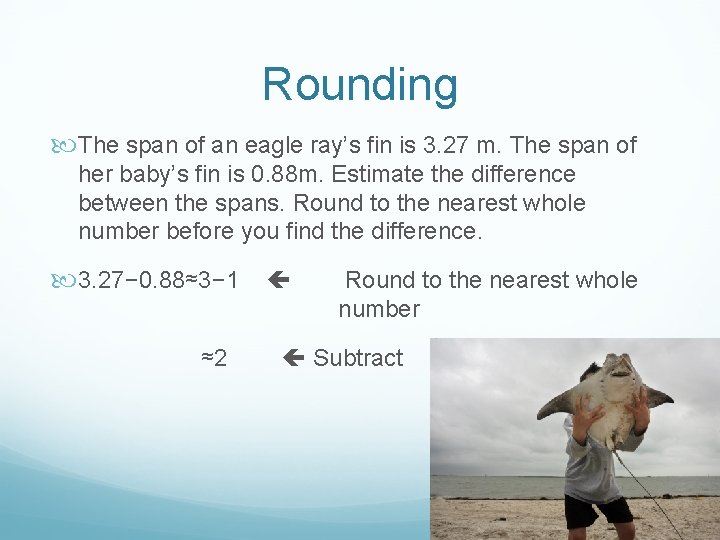 Rounding The span of an eagle ray’s fin is 3. 27 m. The span