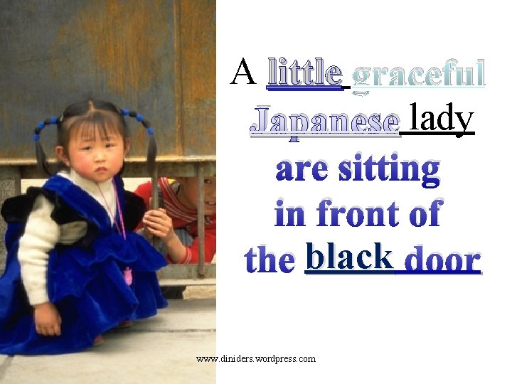 A little graceful Japanese lady are sitting in front of the black door www.