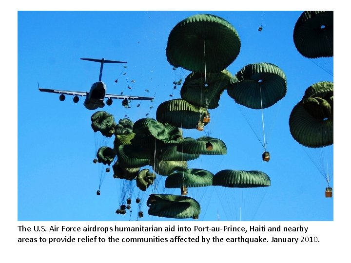 The U. S. Air Force airdrops humanitarian aid into Port-au-Prince, Haiti and nearby areas