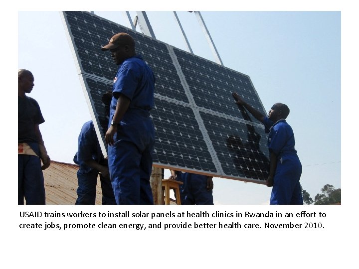 USAID trains workers to install solar panels at health clinics in Rwanda in an