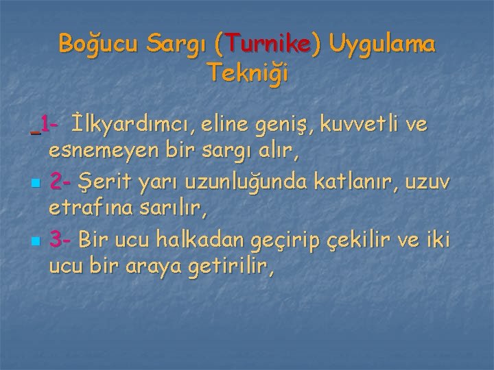 Boğucu Sargı (Turnike) Uygulama Tekniği 1 - İlkyardımcı, eline geniş, kuvvetli ve esnemeyen bir