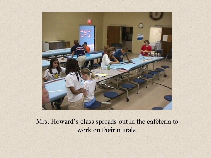 Mrs. Howard’s class spreads out in the cafeteria to work on their murals. 