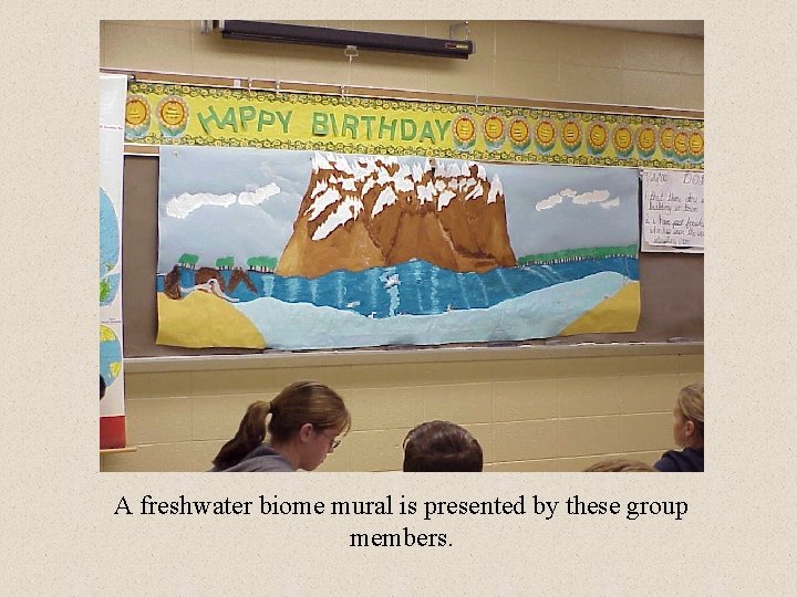 A freshwater biome mural is presented by these group members. 