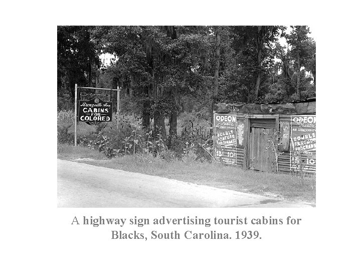 A highway sign advertising tourist cabins for Blacks, South Carolina. 1939. 