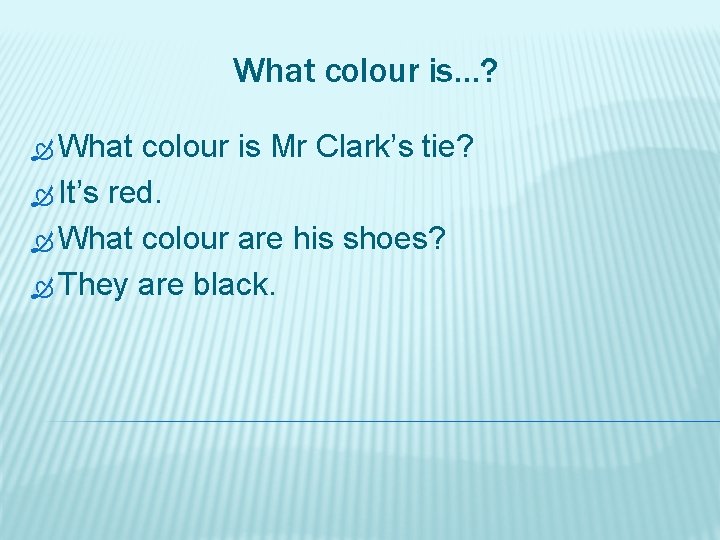 What colour is…? What colour is Mr Clark’s tie? It’s red. What colour are