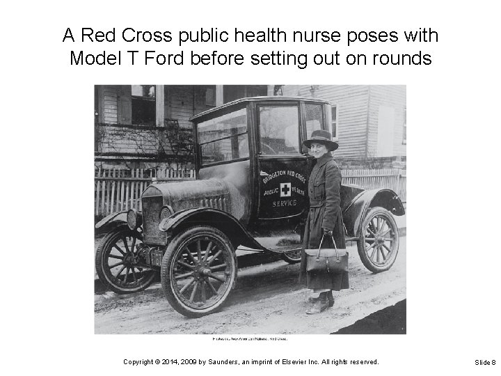 A Red Cross public health nurse poses with Model T Ford before setting out A Red Cross public health nurse poses with Model T Ford before setting out