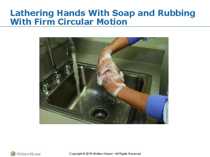 Lathering Hands With Soap and Rubbing With Firm Circular Motion Copyright © 2015 Wolters