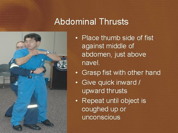 Abdominal Thrusts • Place thumb side of fist against middle of abdomen, just above