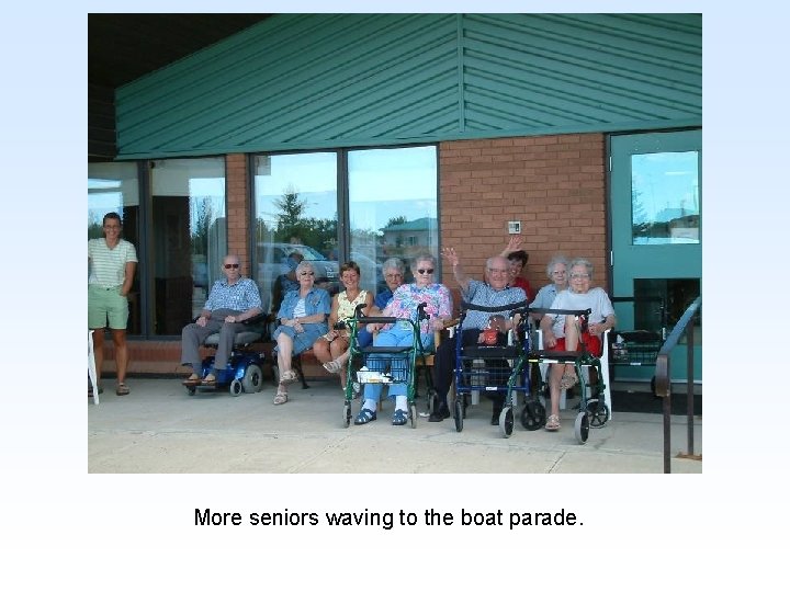 More seniors waving to the boat parade. 