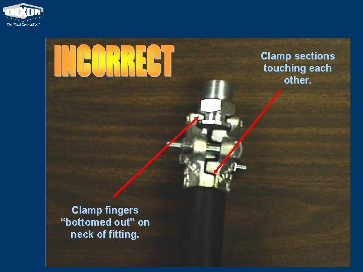 Clamp sections touching each other. Clamp fingers “bottomed out” on neck of fitting. 