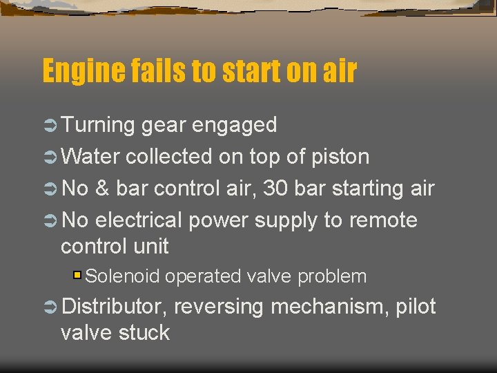 Engine fails to start on air Ü Turning gear engaged Ü Water collected on