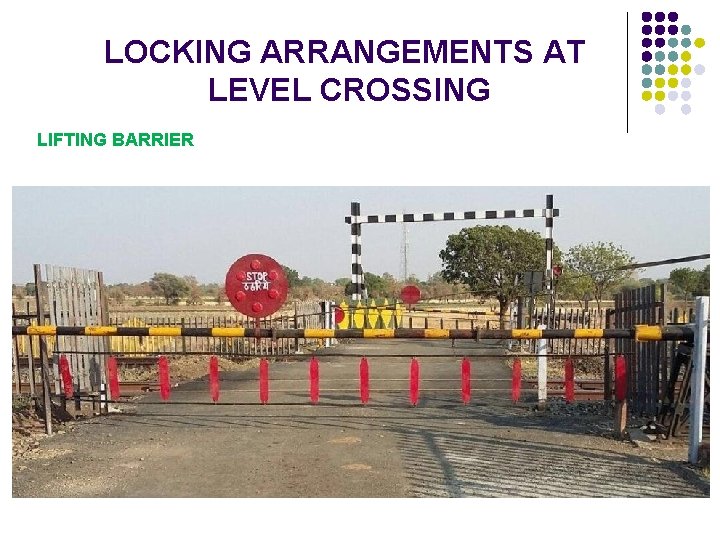 LOCKING ARRANGEMENTS AT LEVEL CROSSING LIFTING BARRIER 