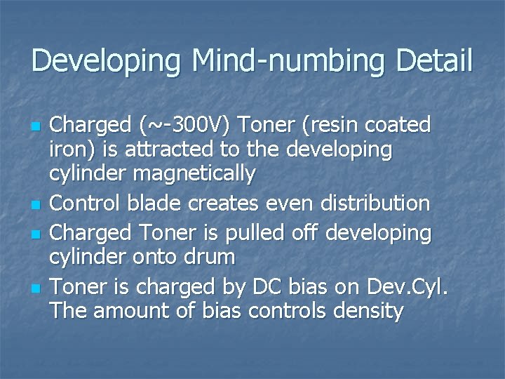 Developing Mind-numbing Detail n n Charged (~-300 V) Toner (resin coated iron) is attracted